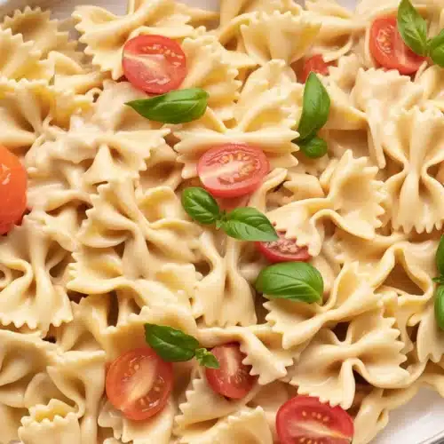 Creamy Boursin Pasta topped with cherry tomatoes and garlic, ready to serve.