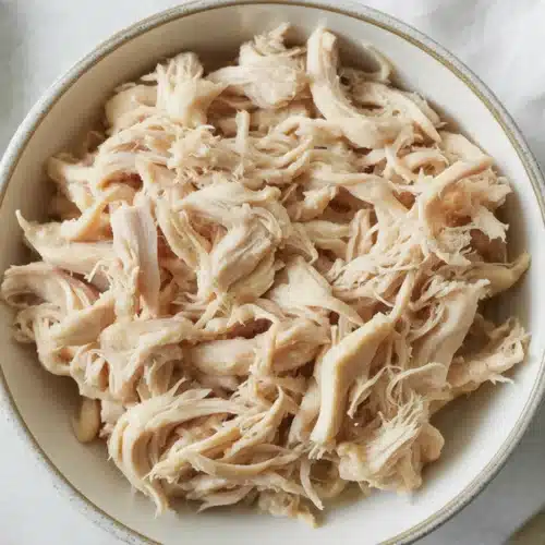 Delicious shredded chicken cooked in various styles for quick and easy meals.